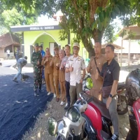 Ikut Ngabret, Pemdes Cisaga Bangun Jalan Hot Mix di Kampung Neglasari